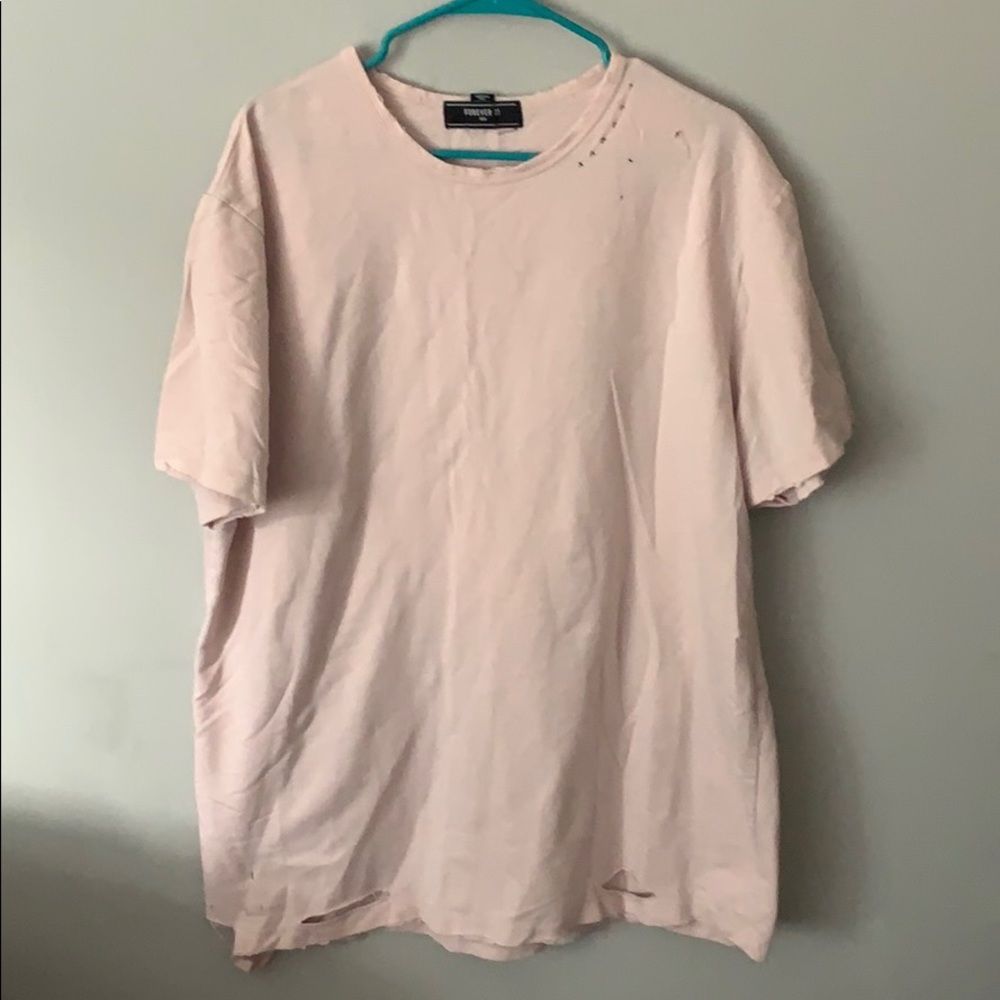 Light pink ripped tee.